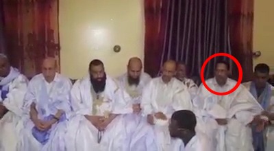 القائد المساعد لأركان الدرك الجنرال عبد الله ولد أحمد عيشه خلال الاجتماع السياسي ويظهر في الصورة المرشح ولد الغزواني