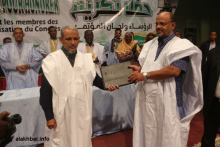 رئيس "تواصل" السابق محمد جميل ولد منصور، والحالي محمد محمود ولد سيدي خلال نشاط حزبي سابق (الأخبار - أرشيف)
